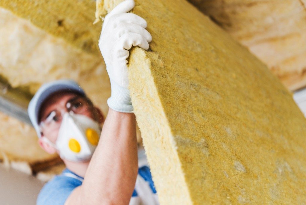 worker installing insulations